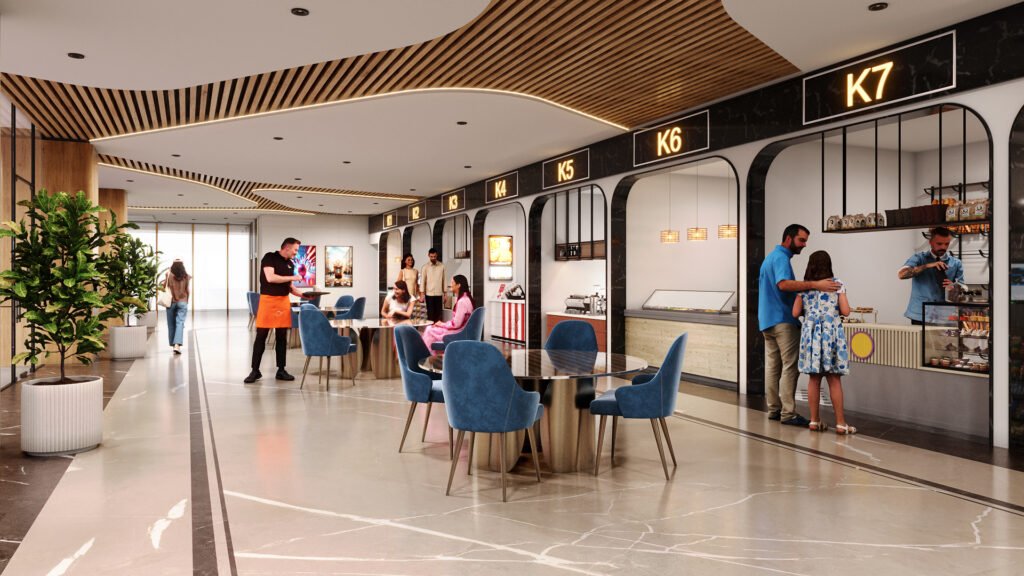 Modern food court with multiple kiosks labeled K1 to K7, serving food and beverages. People dining and ordering food, with stylish seating and tables. Bright and spacious interior with contemporary lighting and decor, creating a welcoming environment for families and visitors.
