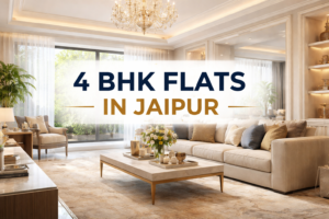 Luxury 4 BHK flats in Jaipur concept image featuring an elegant modern living room with premium beige sofa, marble center table, gold accents, soft lighting, and spacious interior design showcasing upscale lifestyle living